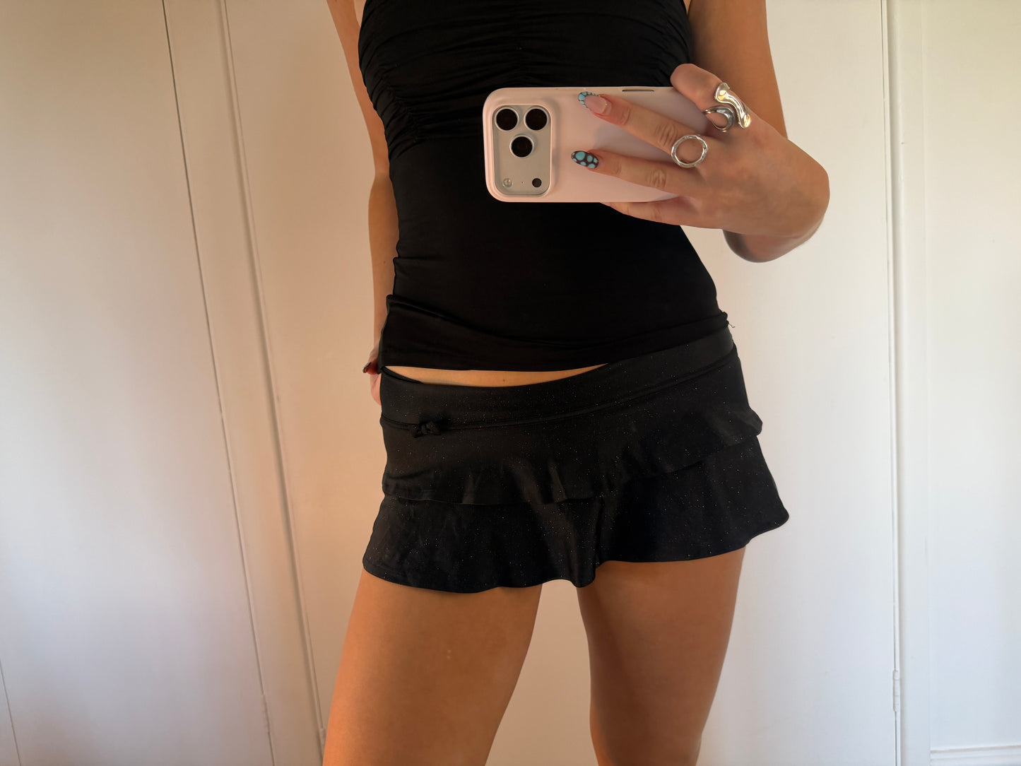 black mini skirt