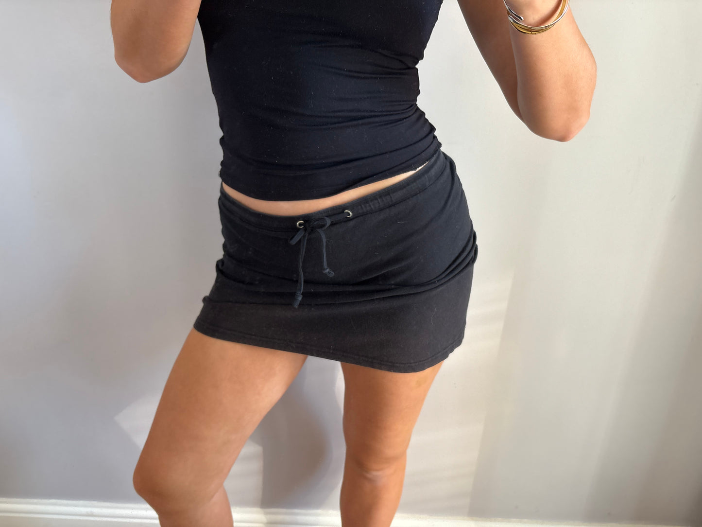 black mini skirt